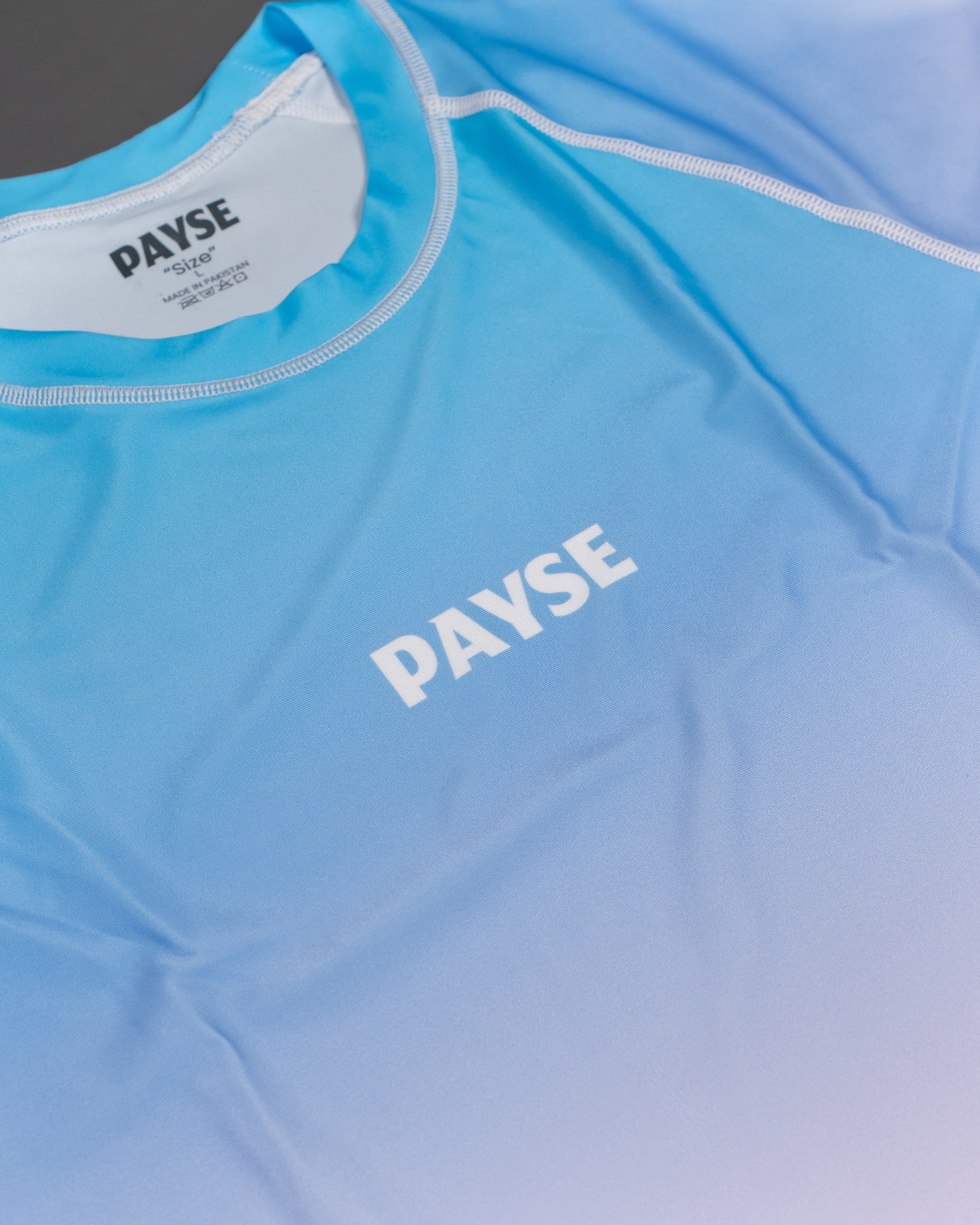 PAYSE Solara Rashguard für Jiu-Jitsu – Nahaufnahme vom Logo auf der Brust vom Rashguard